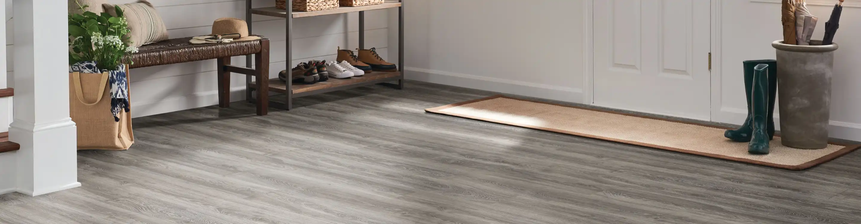 Gray laminate floors in an entryway